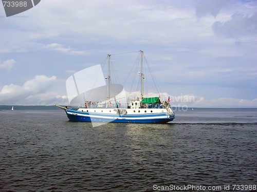 Image of Yacht on the waves