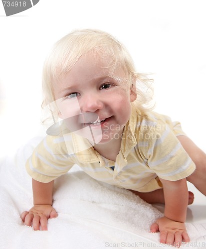 Image of Boy Crawling and Looking Towards the Viewer