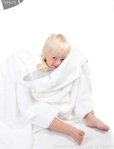 Image of Boy Playing Peek a Boo With a Towel