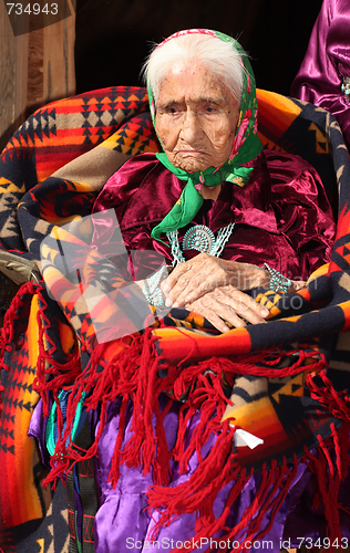 Image of Old Navajo Woman Deep in Thought With Hands Crossed