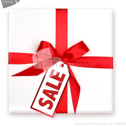 Image of Pretty Wrapped Holiday Gift With Decorated SALE Tag