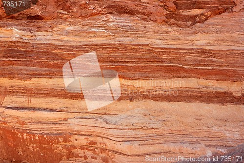 Image of Rough red striped rock texture