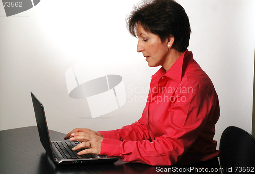 Image of business woman at computer 2057