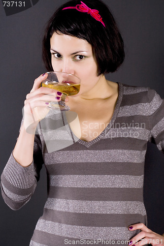 Image of attractive girl drinking vine