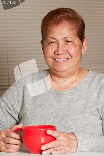 Image of Smiling friendly senior woman