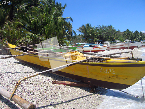 Image of fishing boats on the beach near puerta galera the philippines