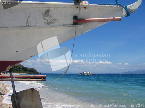 Image of bancas on verde island near puerta galera the philippines