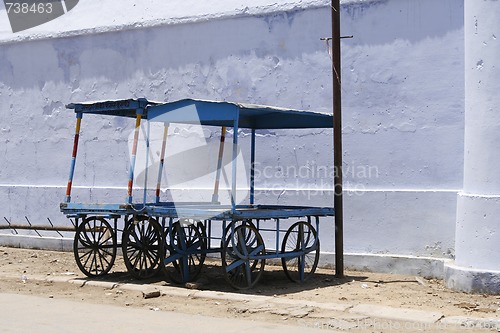 Image of Pair of blue wooden market carts in the streets of Pushkar, Indi