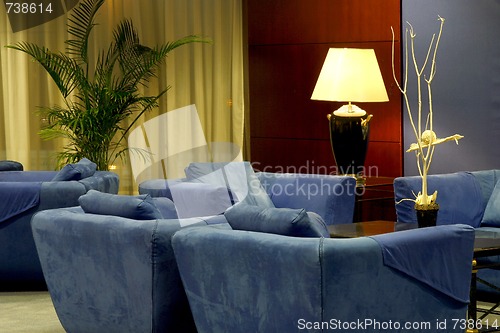 Image of Hotel lobby with comfortable blue couches
