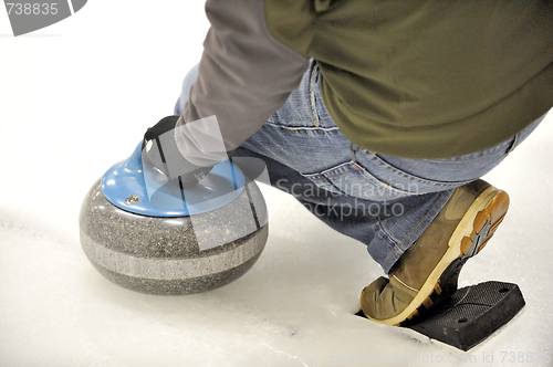 Image of Curling-Launching the Rock.