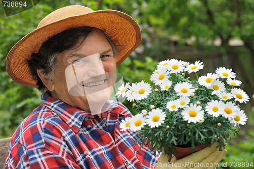 Image of Senior woman gardening