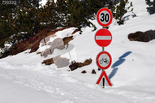 Image of Street Signs covered by Snow, Dolomites, Italy, 2007