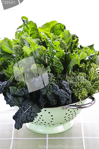 Image of Dark green leafy vegetables in colander