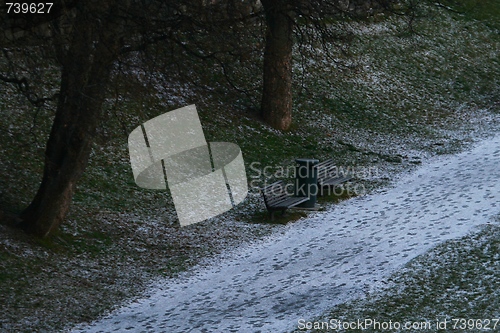 Image of Empty bench in winter