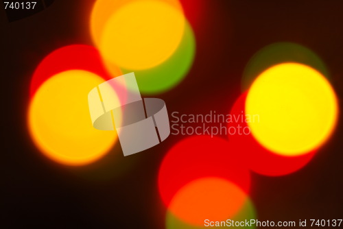Image of Christmas lights glowing (blur motion background)