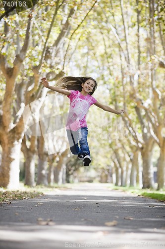 Image of Tween Girl Jumping