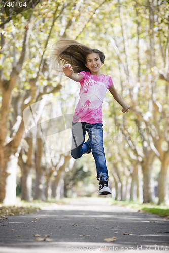 Image of Tween Girl Jumping