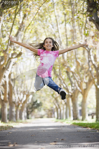 Image of Tween Girl Jumping