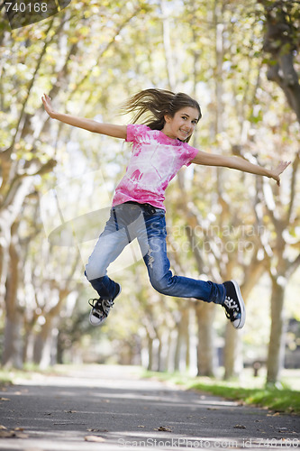 Image of Tween Girl Jumping