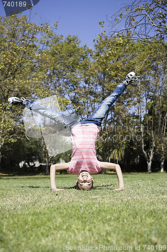 Image of Tween Girl doing Headstand