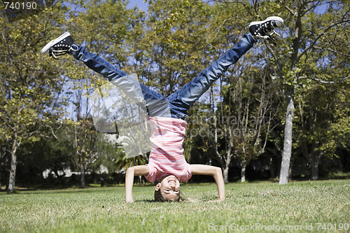 Image of  Tween Girl Doing Headstand