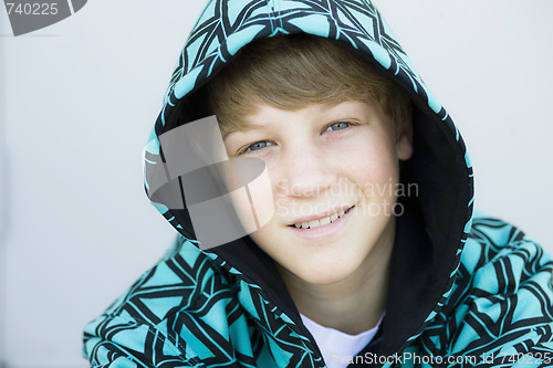 Image of Boy in Hood Smiling To Camera