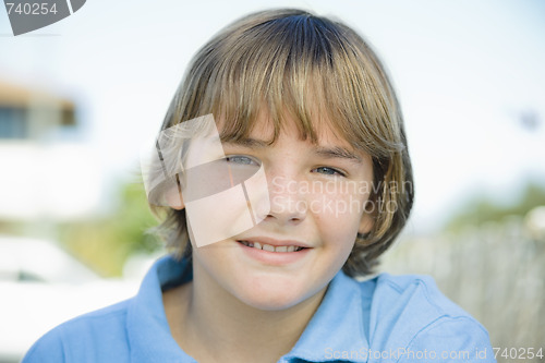 Image of Portrait of Smiling Boy Outdoors