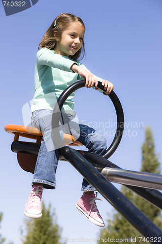 Image of Girl on Seesaw