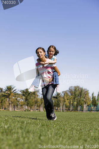 Image of Two Sisters in Park