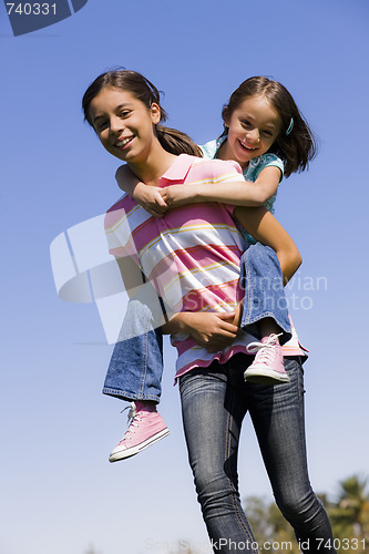 Image of Two Sisters in Park