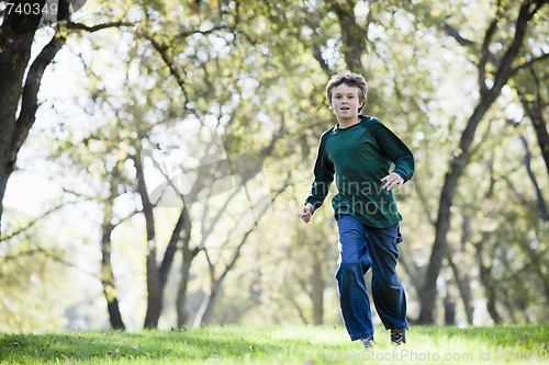 Image of Young Boy Running