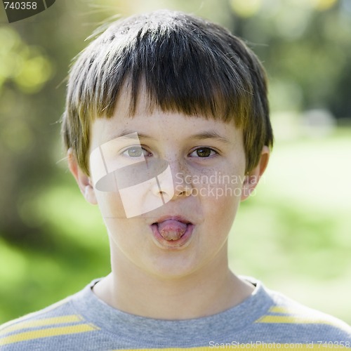 Image of Boy Sticking Tongue Out