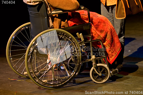 Image of Handicapped woman sitting on wheelchair 