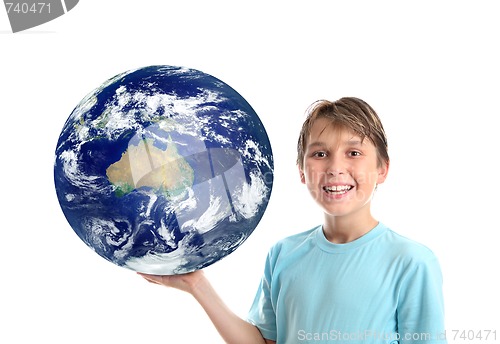 Image of Smiling child holding our world planet showing Australia Oceania