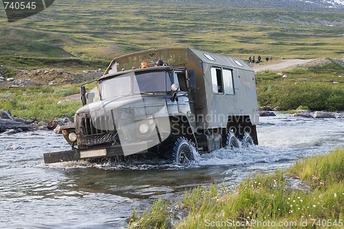 Image of Truck crossing a river