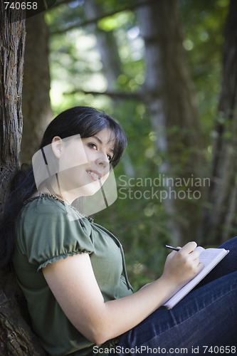 Image of Young Woman in Woods 