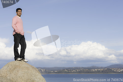 Image of Portrait of Man Standing on Rock