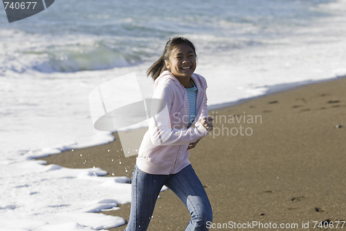 Image of Teenage Asian Girl at Beach