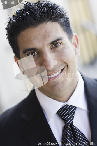 Image of Portrait of Smiling Man in Suit and Tie