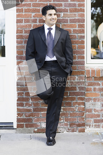 Image of Smiling Man in Suit and Tie