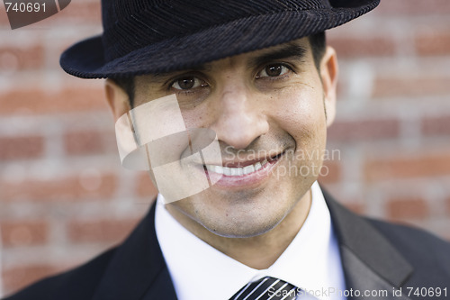 Image of Portrait of Smiling Man in Suit and Tie