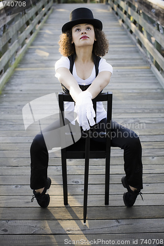 Image of Jazz Dancer Sitting in Chair