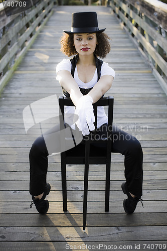 Image of Jazz Dancer Sitting in Chair