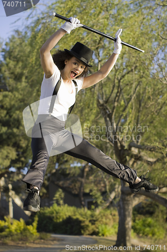 Image of Jazz Dancer Jumping in Park