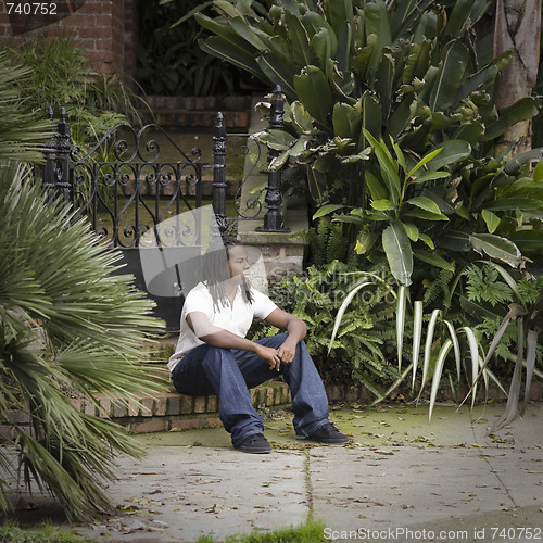 Image of Teen Boy Sitting on Step