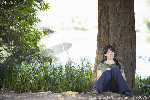 Image of Young Woman Writing in Journal