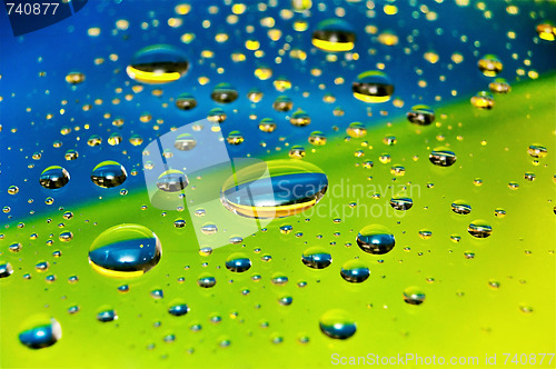 Image of Colorful rain drops on the glass 