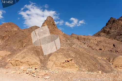 Image of Scenic triangular rocks in stone desert