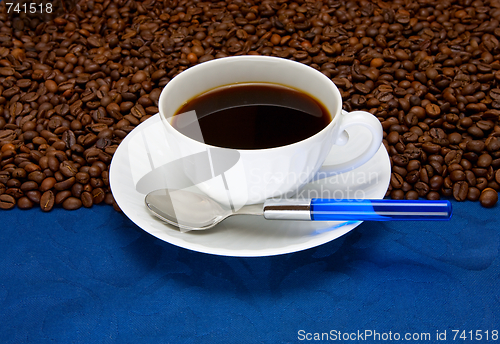 Image of Cup of  coffee on a blue background