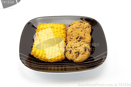 Image of cookies on plate isolated on white backgrounds